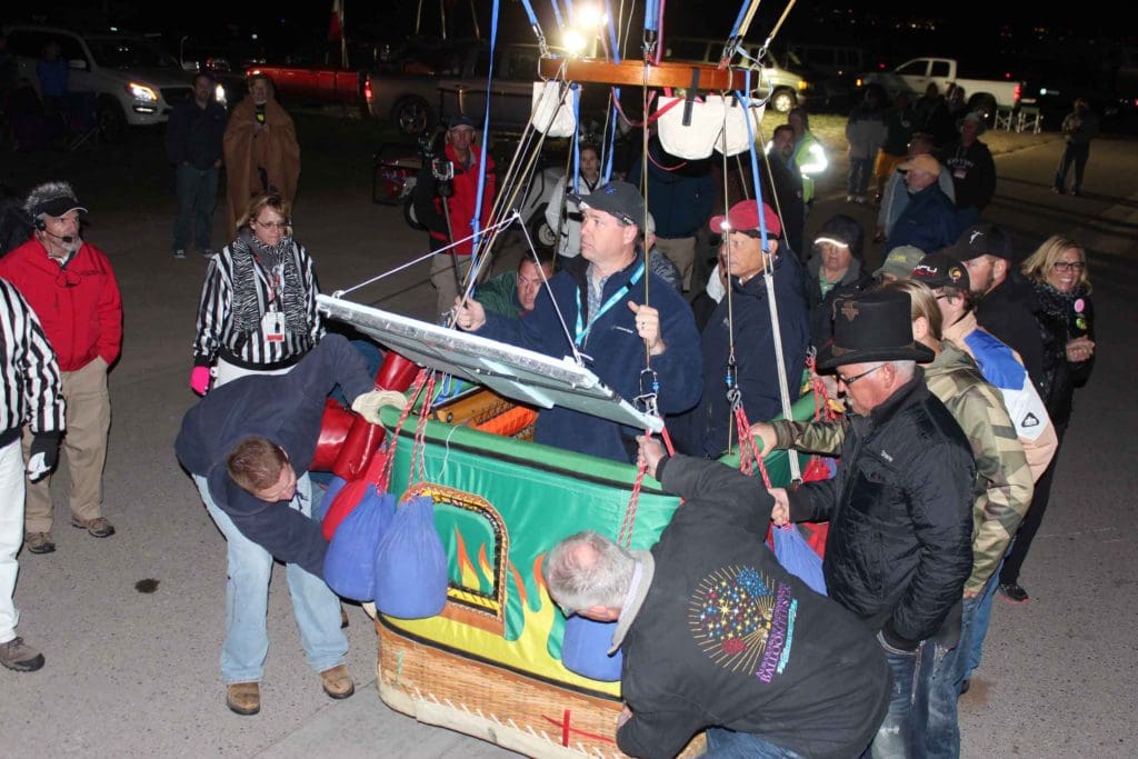 Balloon pilots Noah Forden and Bert Padelt's crew escort their balloon to the launch platform. Photo courtesy: Kim Vesely, America's Challenge