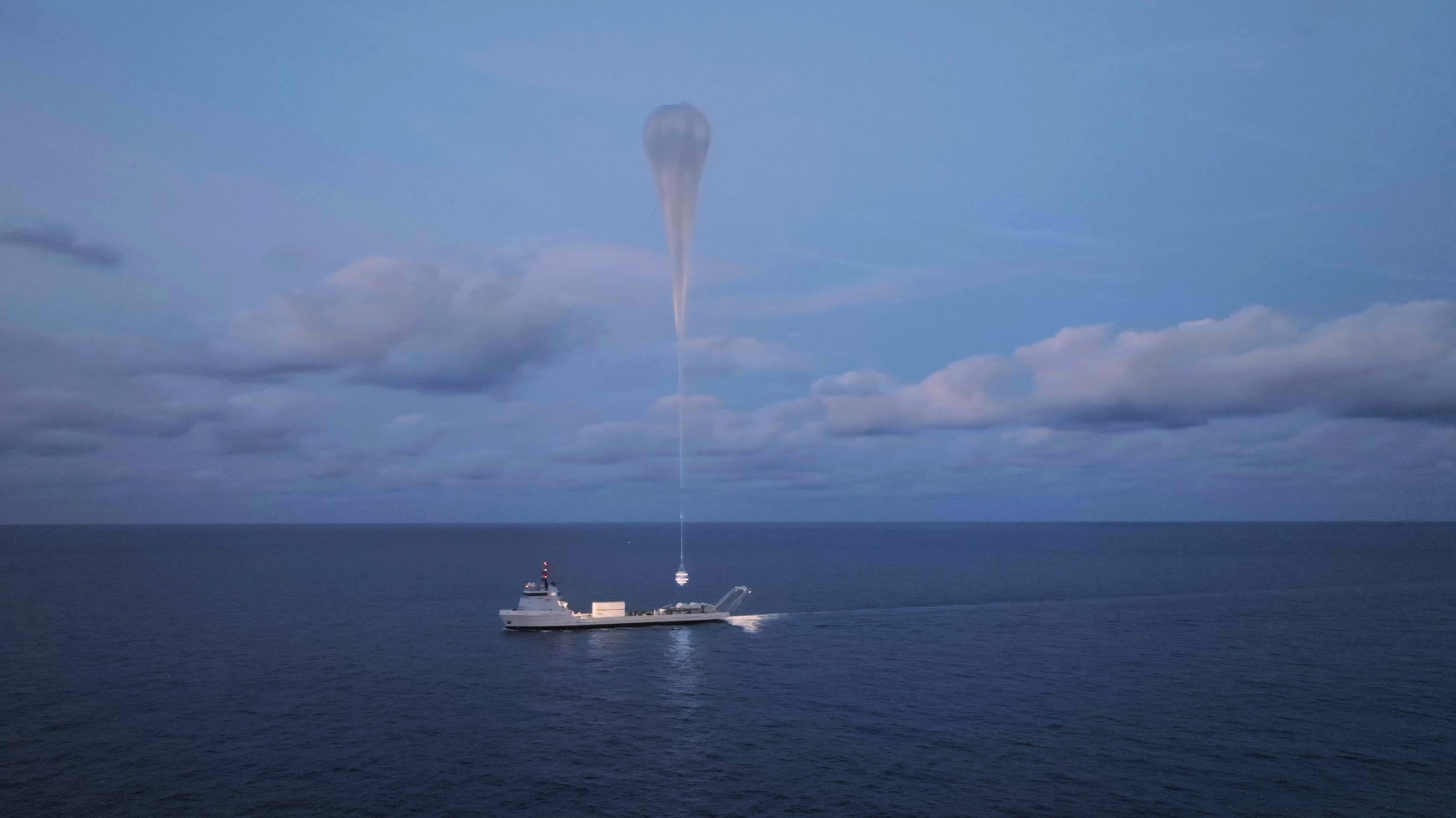Hydrogen Balloon Lifts Largest Space Capsule into Near Space - Richard Branson to Co-Pilot First Crewed Mission